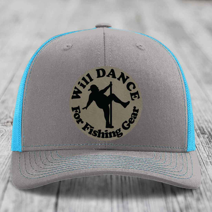 Grey trucker hat with blue mesh back and black embroidered patch reading &