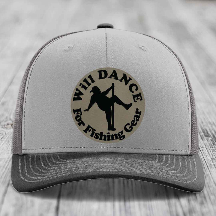 Grey trucker hat with black embroidered patch reading &