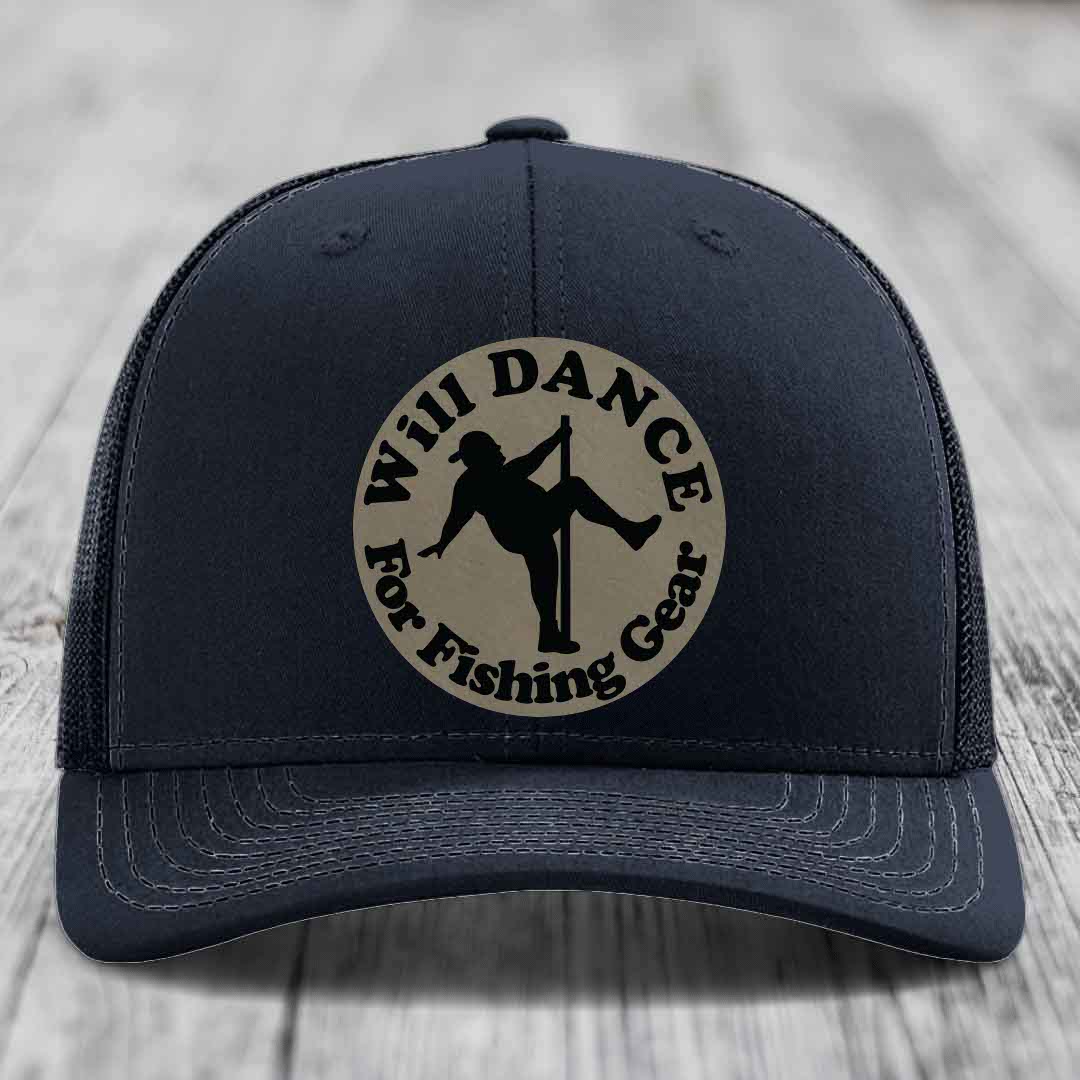 Dark blue trucker hat with circular beige patch featuring black text and silhouette of person dancing for fishing gear.