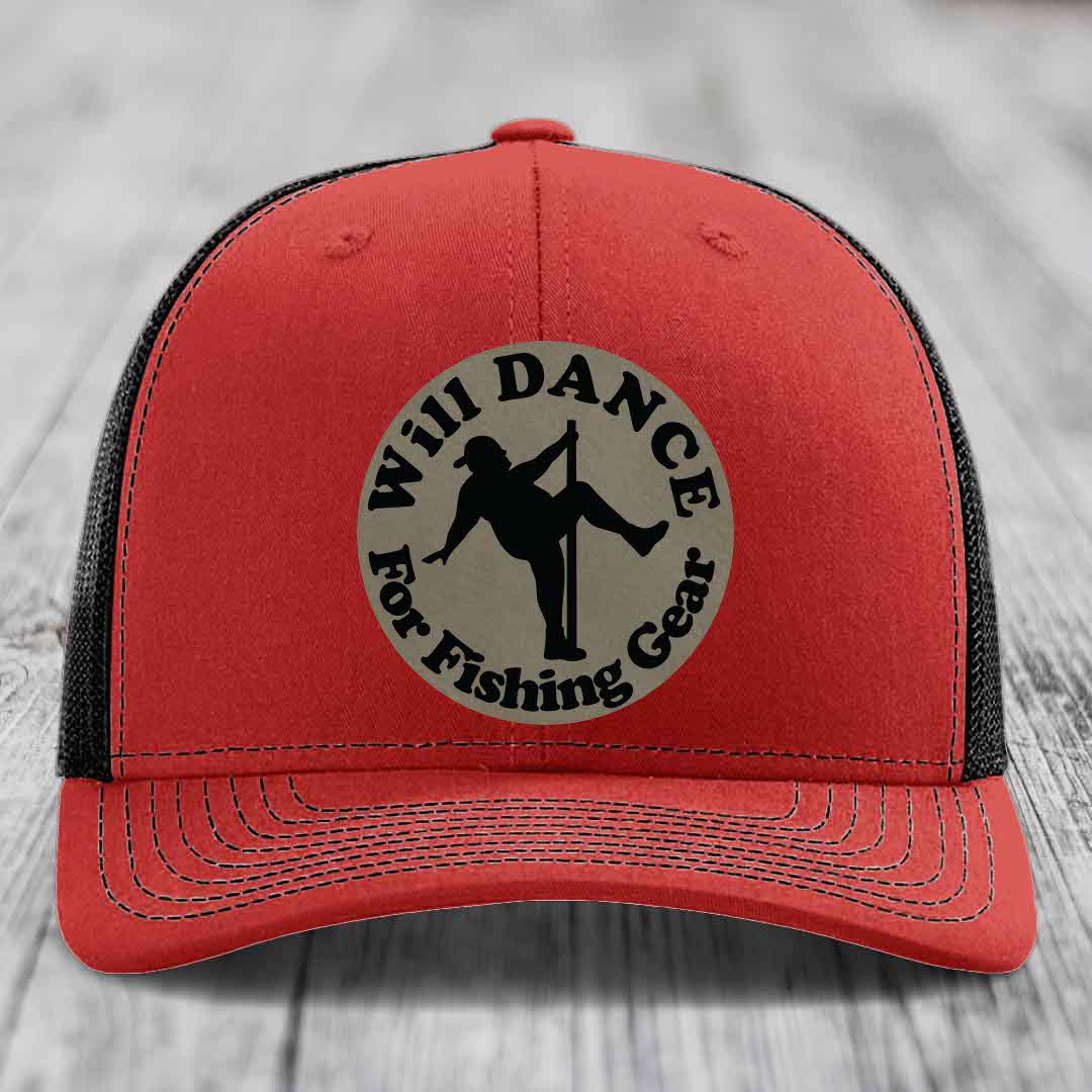 Red trucker hat with black mesh back and gray circular patch that says &
