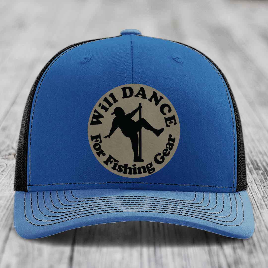 Blue trucker hat with black mesh back and a circular beige patch that reads &