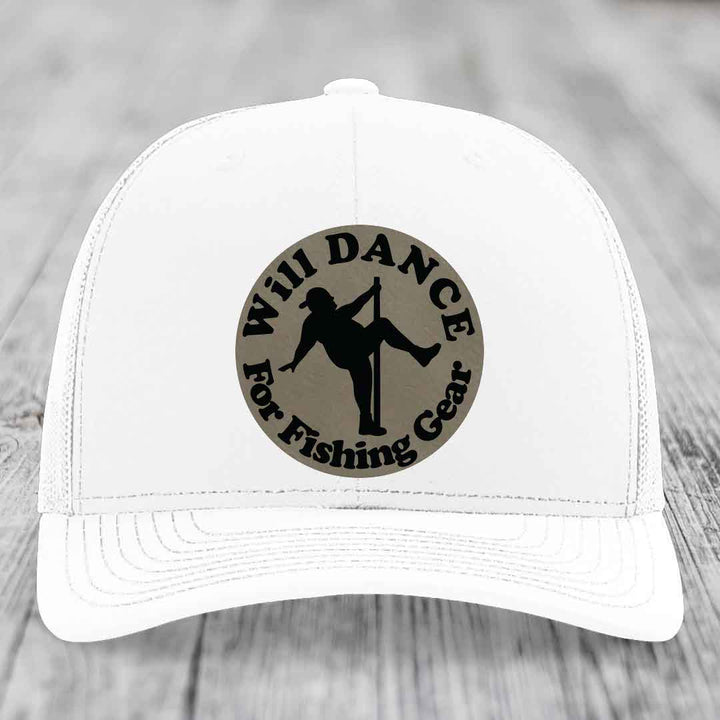 White trucker hat with circular patch showing silhouette of person dancing and text &
