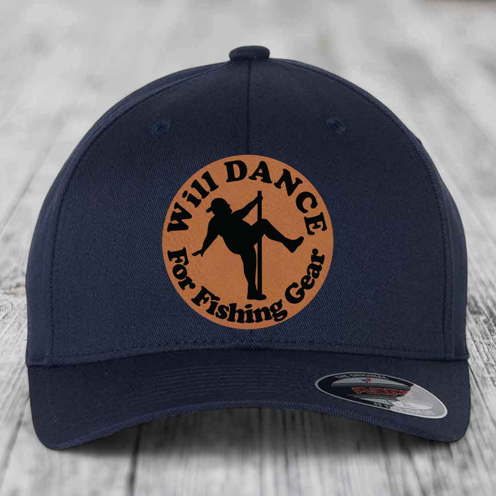 Dark blue baseball cap with circular brown leather patch featuring black silhouette of person pole dancing and text &
