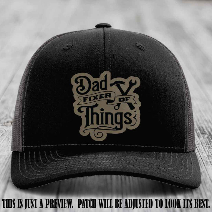 Dad Fixer of Things 🔧 Leather Patch Hat – Light Brown to Black Patch on Black to Charcoal Hat