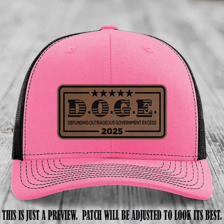 D.O.G.E. 2025 leather patch hat with dark brown to black patch on a hot pink to black hat