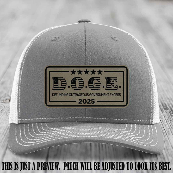 D.O.G.E. 2025 leather patch hat with light brown to black patch on a heather grey to white hat