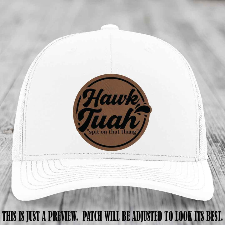 Hawk Tuah 'Dark Brown to Black' patch on White Hat Richardson 112 hat