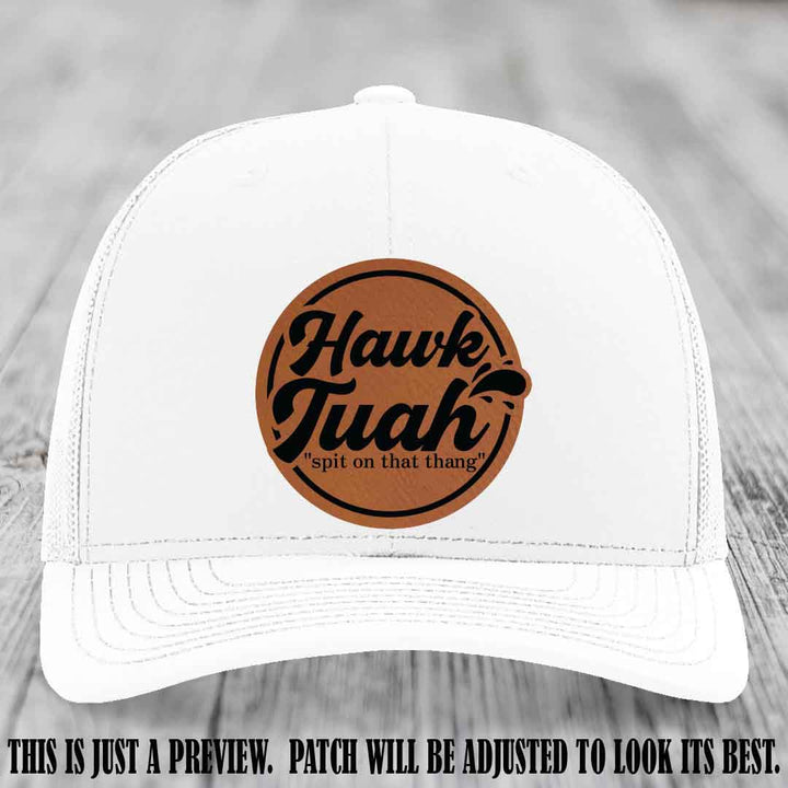 Hawk Tuah 'Rawhide to Black' patch on White Hat Richardson 112 hat