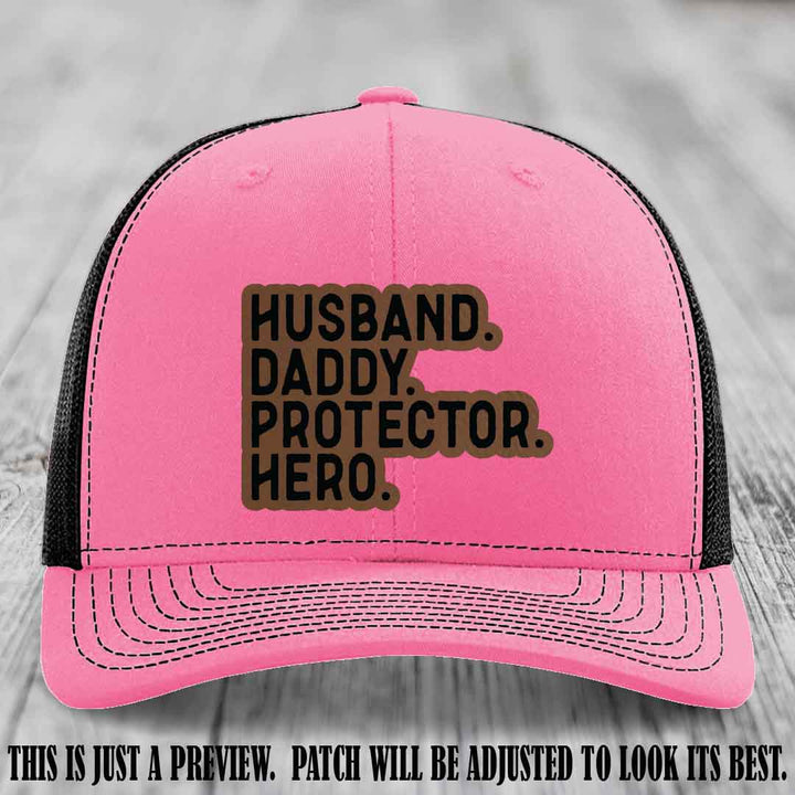 Husband. Daddy. Protector. Hero. Dark Brown to Black Patch on Hot Pink to Black Hat - Richardson 112 Hat
