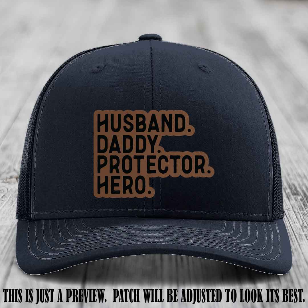Husband. Daddy. Protector. Hero. Dark Brown to Black Patch on Navy Hat - Richardson 112 Hat