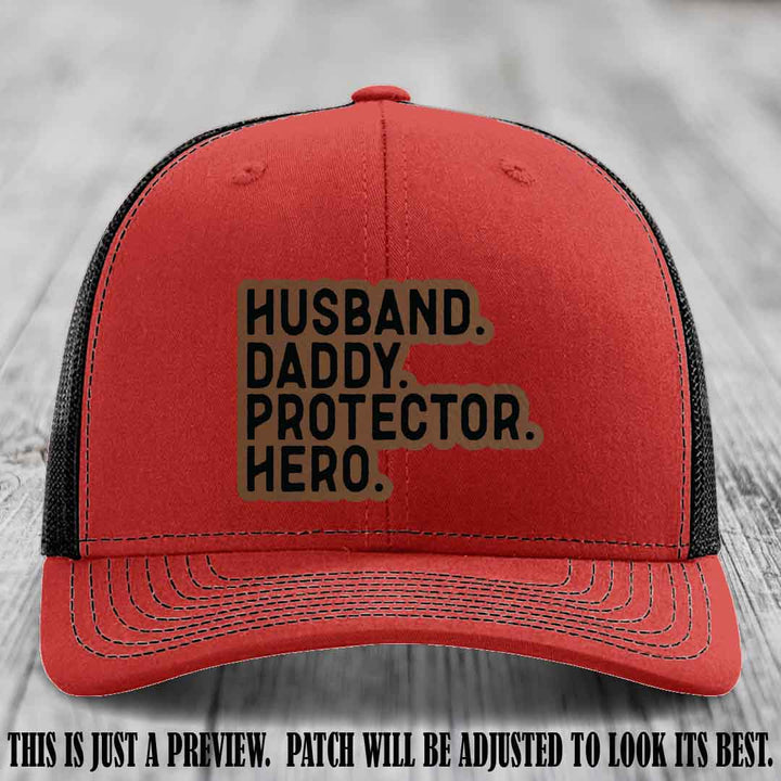 Husband. Daddy. Protector. Hero. Dark Brown to Black Patch on Red to Black Hat - Richardson 112 Hat