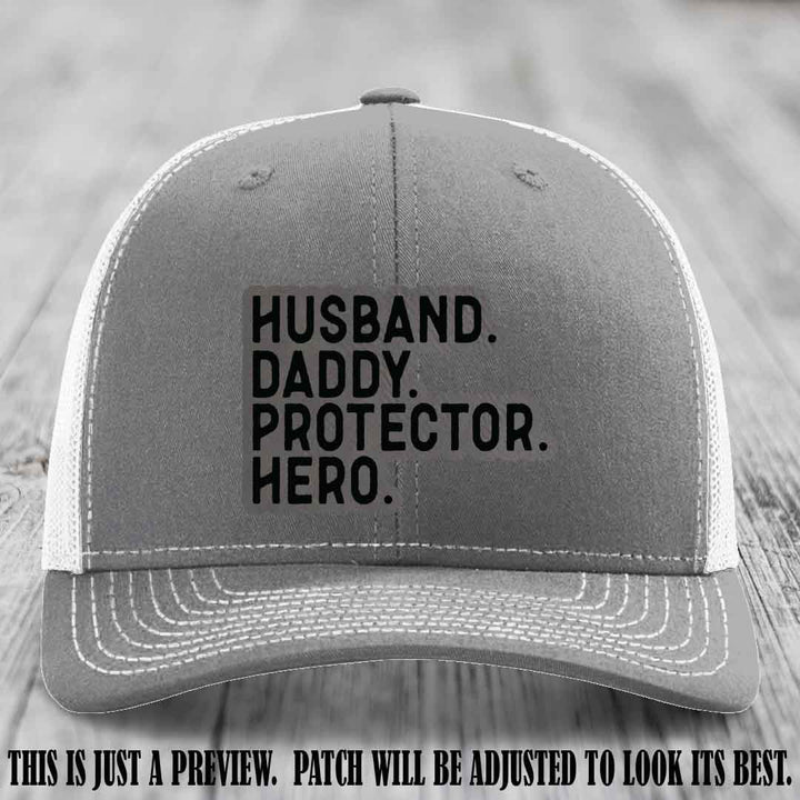 Husband. Daddy. Protector. Hero. Grey to Black Patch on Heather Grey to White Hat - Richardson 112 Hat