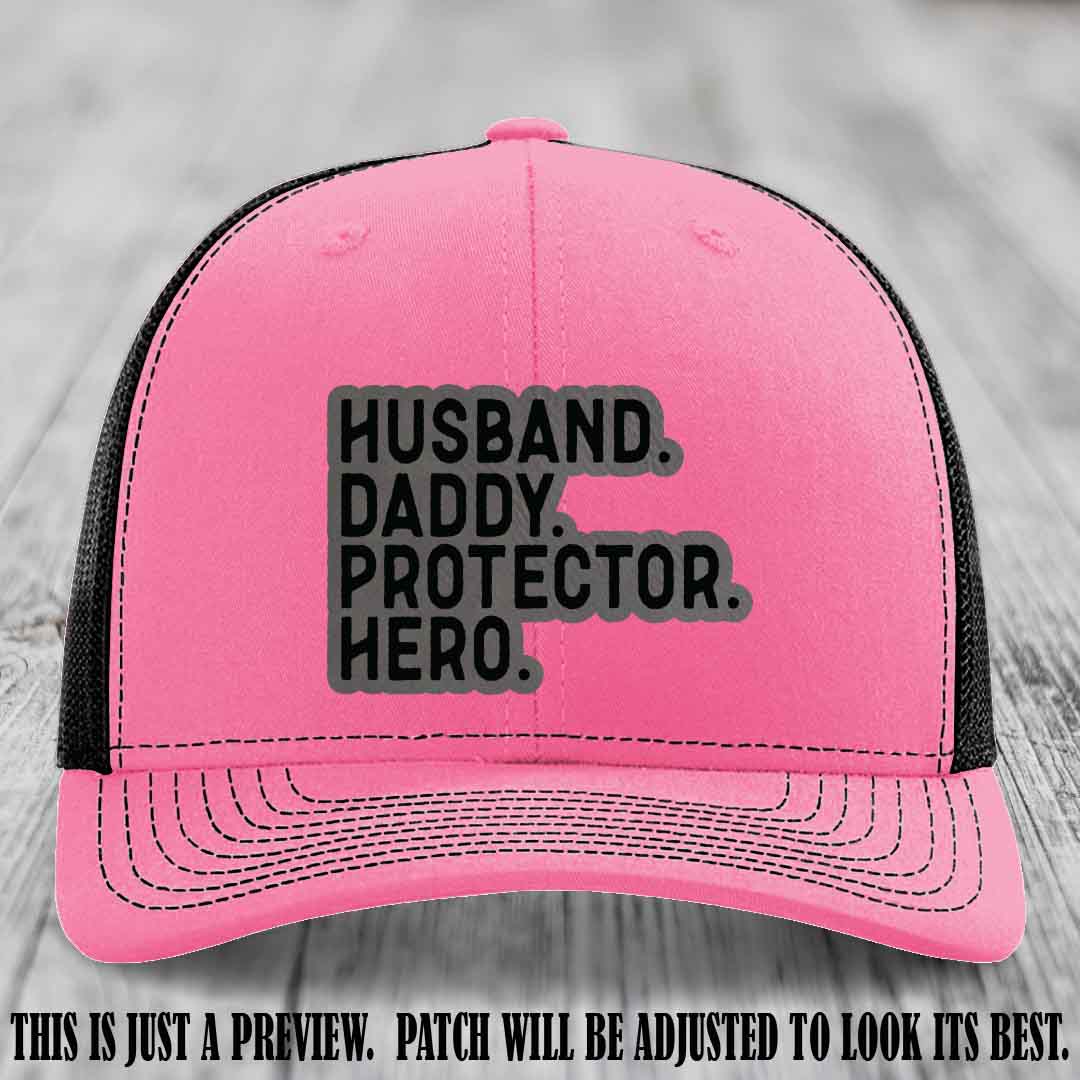 Husband. Daddy. Protector. Hero. Grey to Black Patch on Hot Pink to Black Hat - Richardson 112 Hat