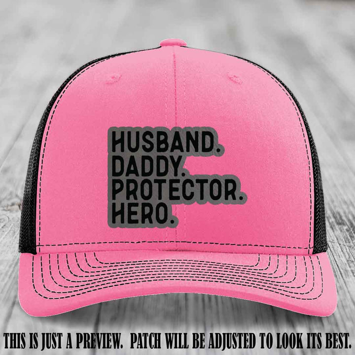 Husband. Daddy. Protector. Hero. Grey to Black Patch on Hot Pink to Black Hat - Richardson 112 Hat