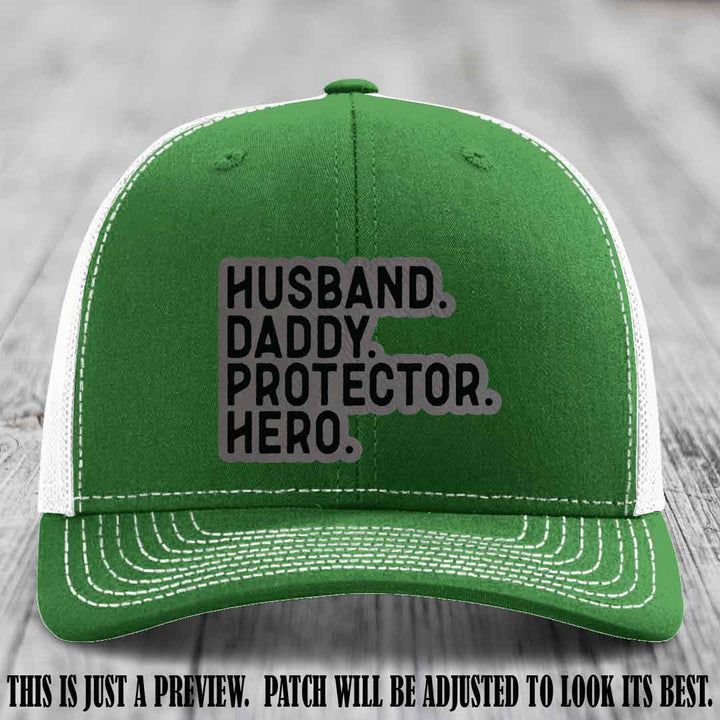 Husband. Daddy. Protector. Hero. Grey to Black Patch on Kelly to White Hat - Richardson 112 Hat