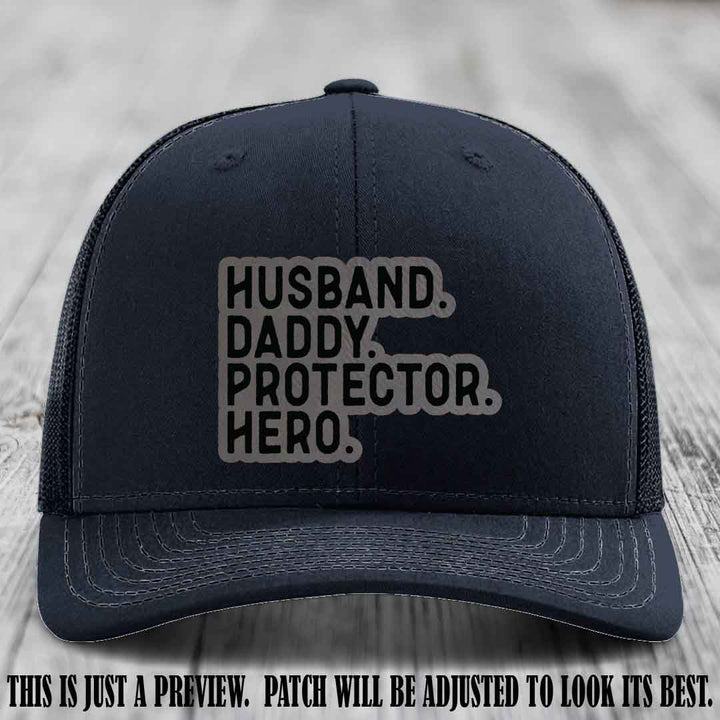 Husband. Daddy. Protector. Hero. Grey to Black Patch on Navy Hat - Richardson 112 Hat