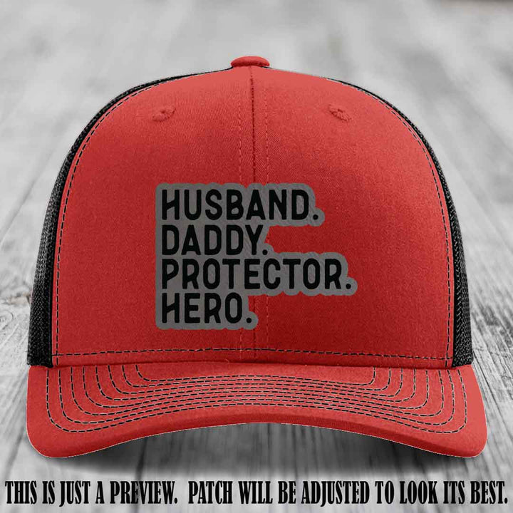 Husband. Daddy. Protector. Hero. Grey to Black Patch on Red to Black Hat - Richardson 112 Hat