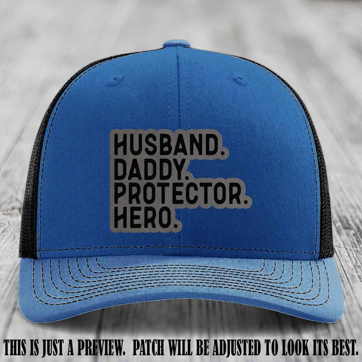 Husband. Daddy. Protector. Hero. Grey to Black Patch on Royal to Black Hat - Richardson 112 Hat