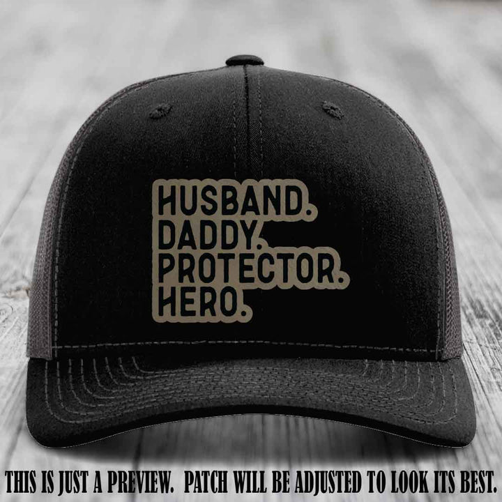 Husband. Daddy. Protector. Hero. Light Brown to Black Patch on Black to Charcoal Hat - Richardson 112 Hat