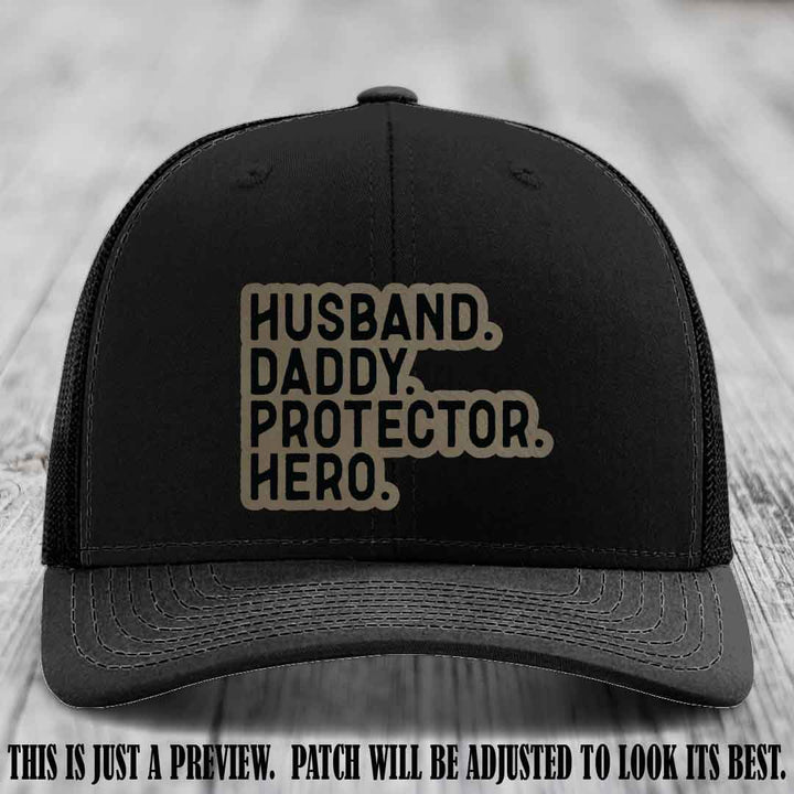Husband. Daddy. Protector. Hero. Light Brown to Black Patch on Black Hat - Richardson 112 Hat