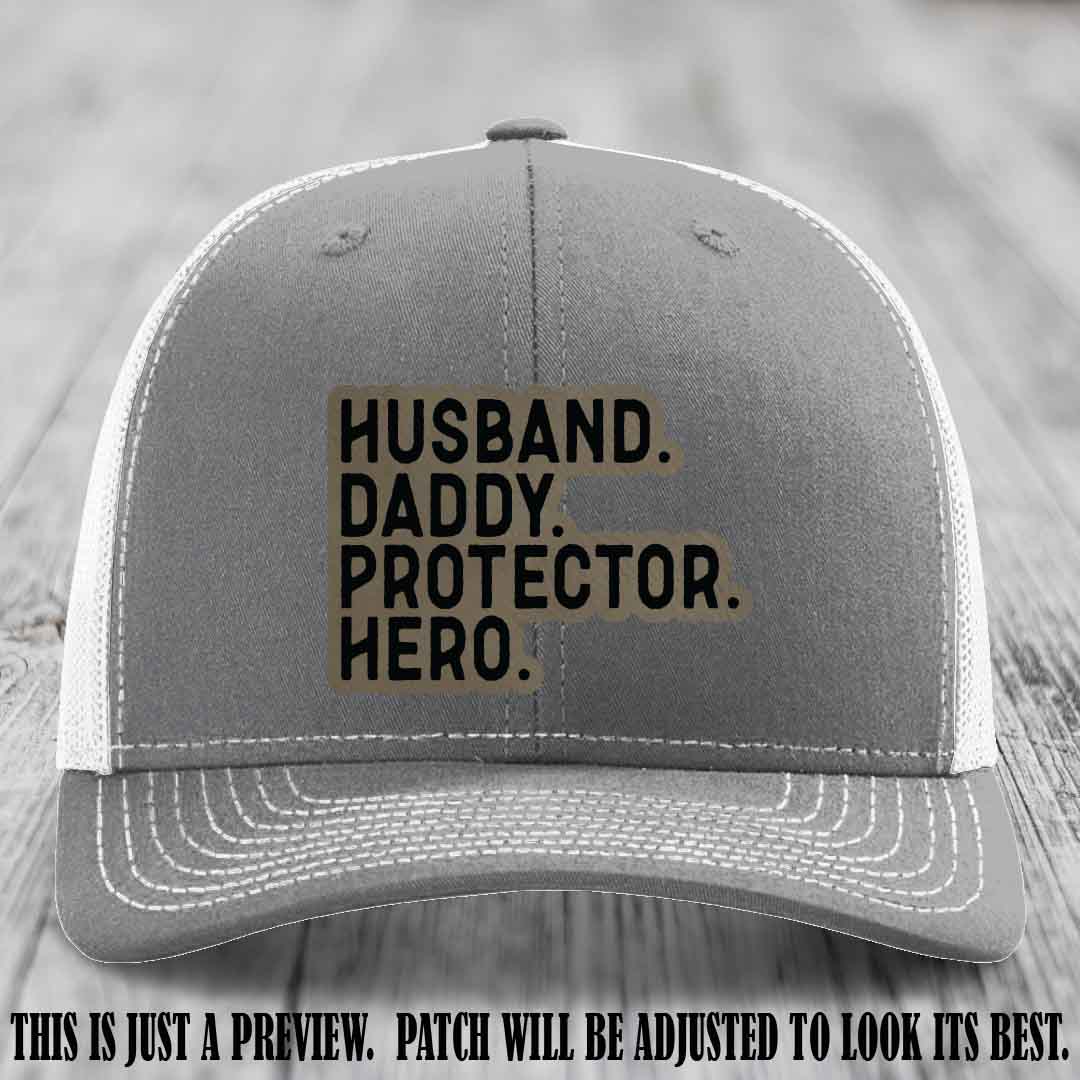 Husband. Daddy. Protector. Hero. Light Brown to Black Patch on Heather Grey to White Hat - Richardson 112 Hat