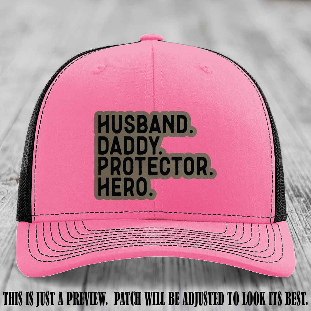 Husband. Daddy. Protector. Hero. Light Brown to Black Patch on Hot Pink to Black Hat - Richardson 112 Hat