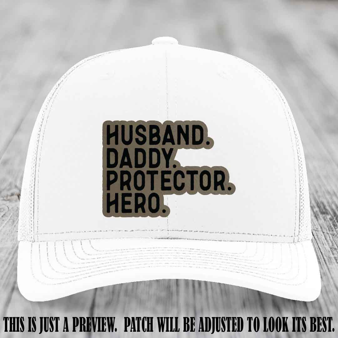 Husband. Daddy. Protector. Hero. Light Brown to Black Patch on White Hat - Richardson 112 Hat