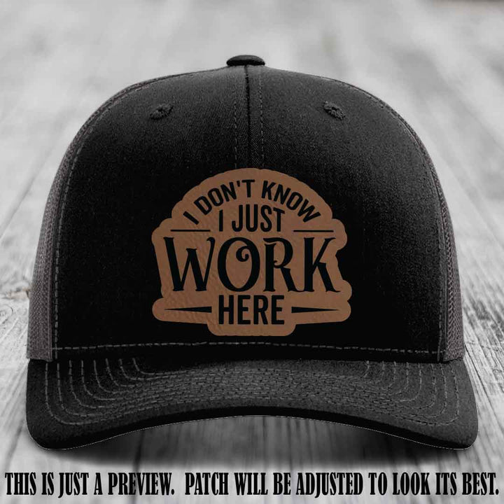 I Don't Know I Just Work Here Dark Brown to Black Patch Leather patch on Black to Charcoal Hat Richardson 112 hat