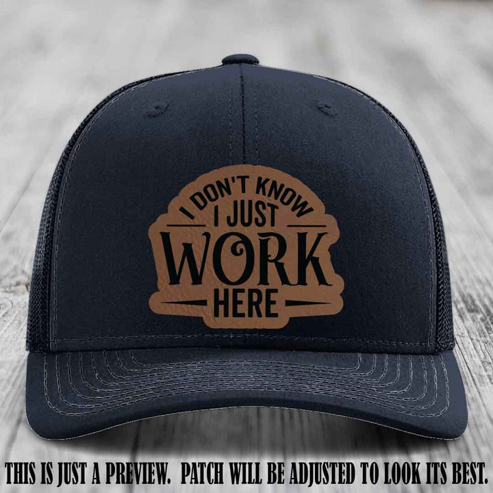 I Don't Know I Just Work Here Dark Brown to Black Patch Leather patch on Navy Hat Richardson 112 hat