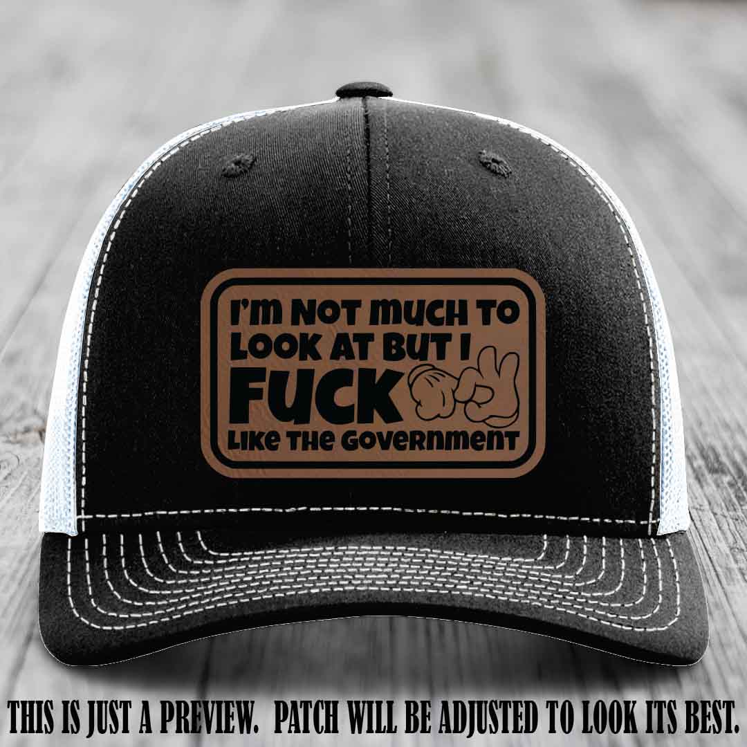 I'm Not Much to Look At Dark Brown to Black Patch on Black to White Hat Richardson 112 trucker hat