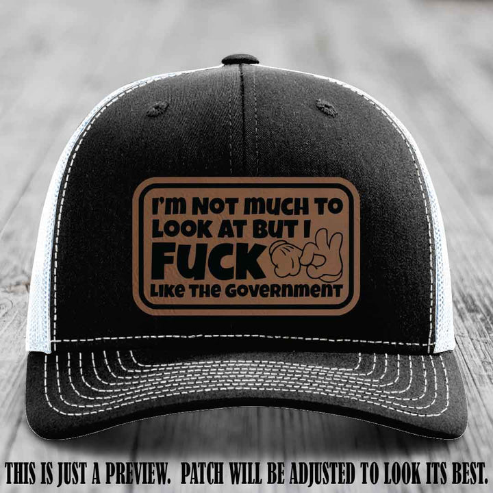 I'm Not Much to Look At Dark Brown to Black Patch on Black to White Hat Richardson 112 trucker hat