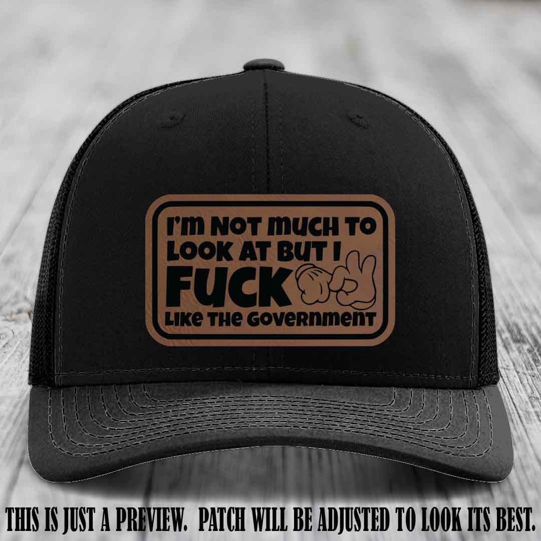 I'm Not Much to Look At Dark Brown to Black Patch on Black Hat Richardson 112 trucker hat