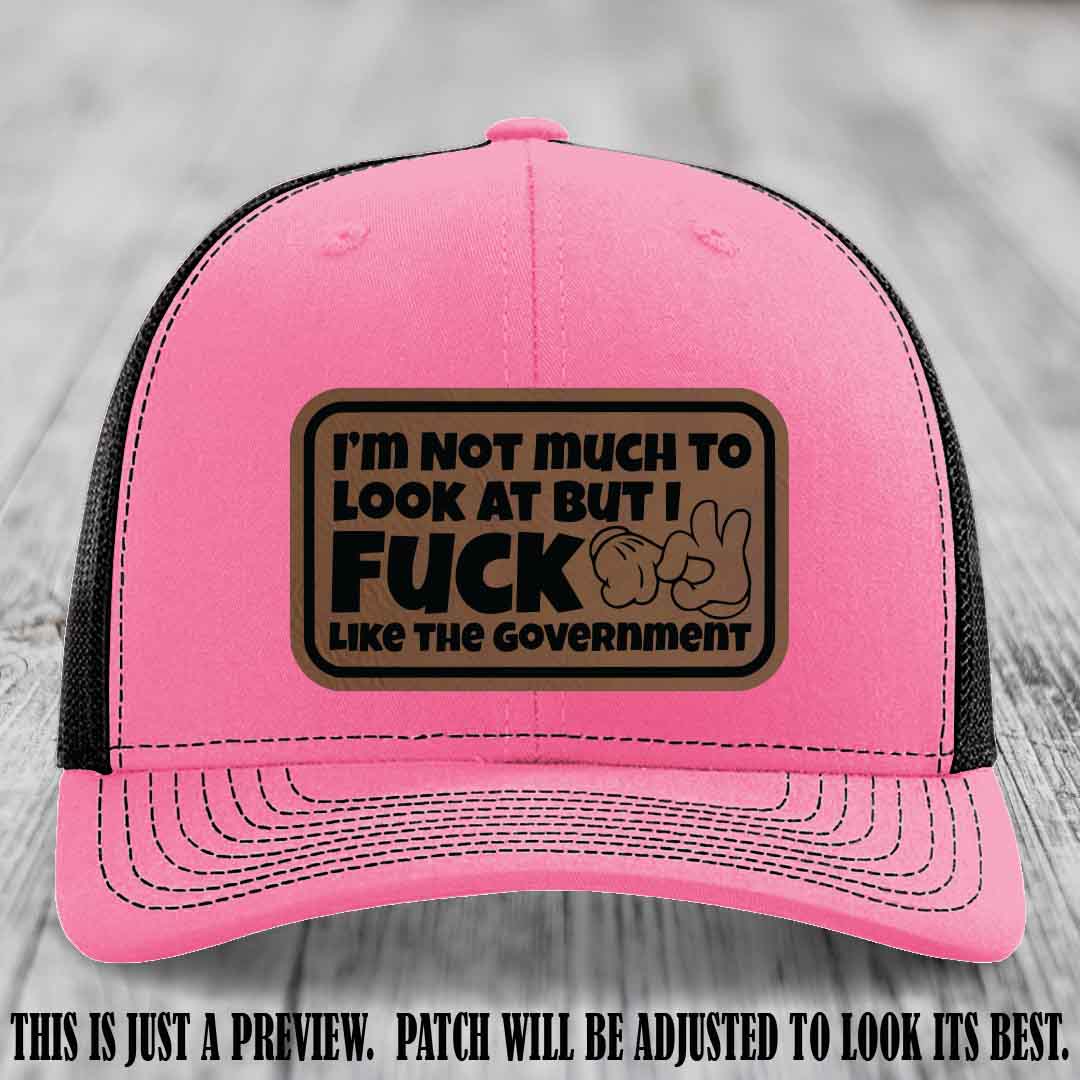 I'm Not Much to Look At Dark Brown to Black Patch on Hot Pink to Black Hat Richardson 112 trucker hat