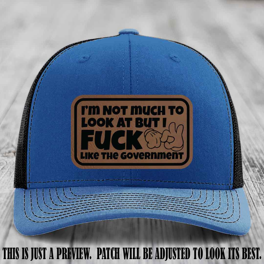 I'm Not Much to Look At Dark Brown to Black Patch on Royal to Black Hat Richardson 112 trucker hat