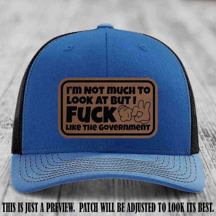 I'm Not Much to Look At Dark Brown to Black Patch on Royal to Black Hat Richardson 112 trucker hat