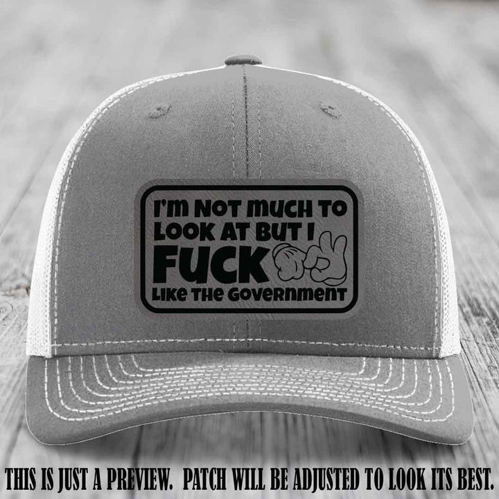 I'm Not Much to Look At Grey to Black Patch on Heather Grey to White Hat Richardson 112 trucker hat