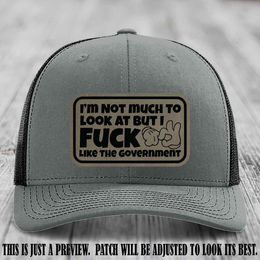 I'm Not Much to Look At Light Brown to Black Patch on Heather Grey to Black Hat Richardson 112 trucker hat