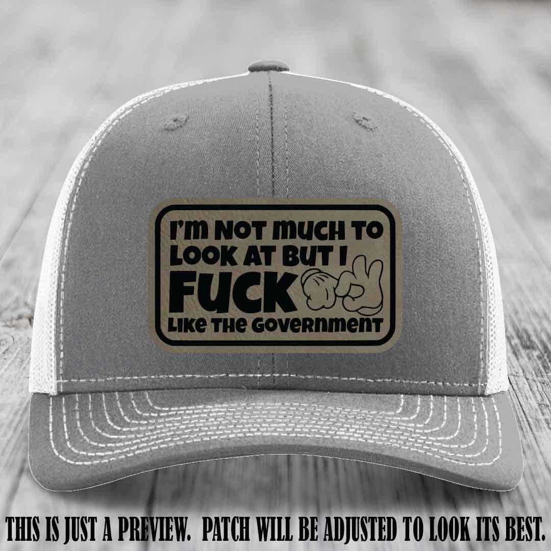 I'm Not Much to Look At Light Brown to Black Patch on Heather Grey to White Hat Richardson 112 trucker hat