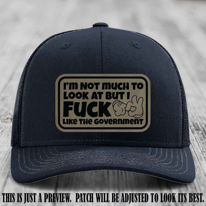 I'm Not Much to Look At Light Brown to Black Patch on Navy Hat Richardson 112 trucker hat