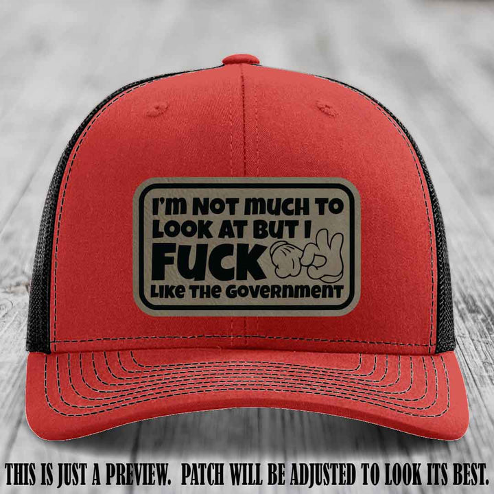 I'm Not Much to Look At Light Brown to Black Patch on Red to Black Hat Richardson 112 trucker hat