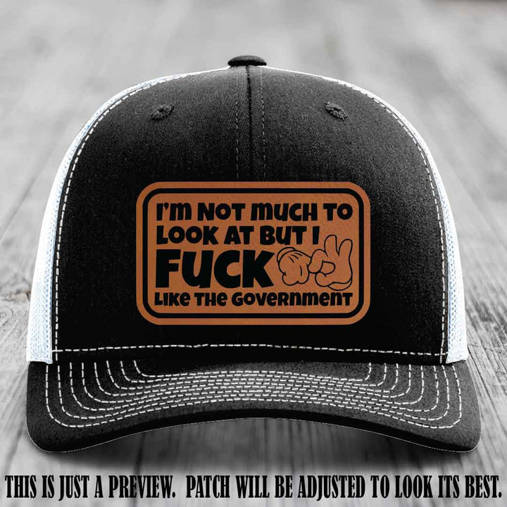 I'm Not Much to Look At Rawhide to Black Patch on Black to White Hat Richardson 112 trucker hat