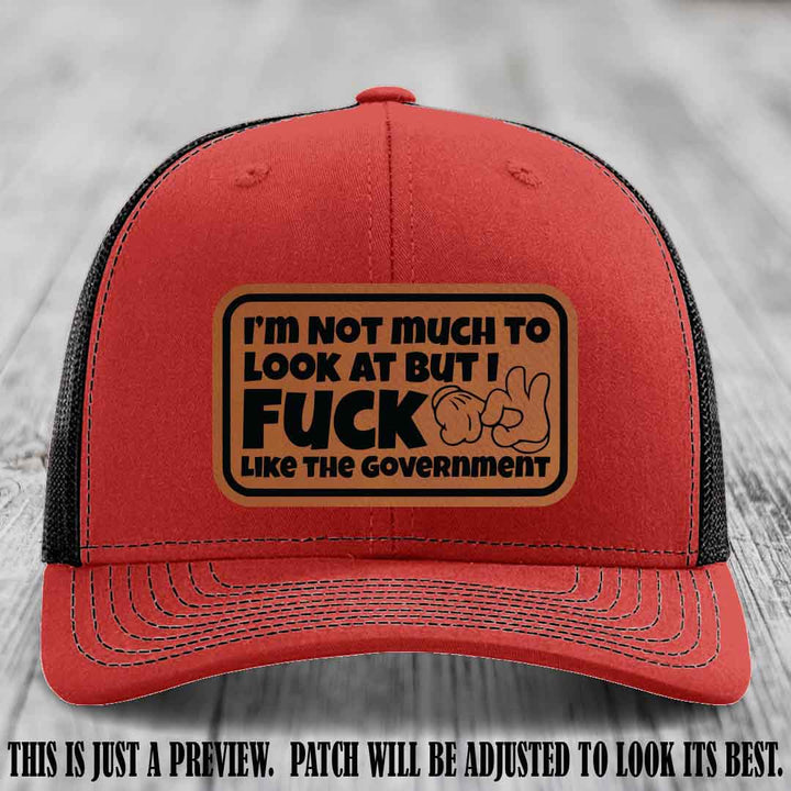 I'm Not Much to Look At Rawhide to Black Patch on Red to Black Hat Richardson 112 trucker hat