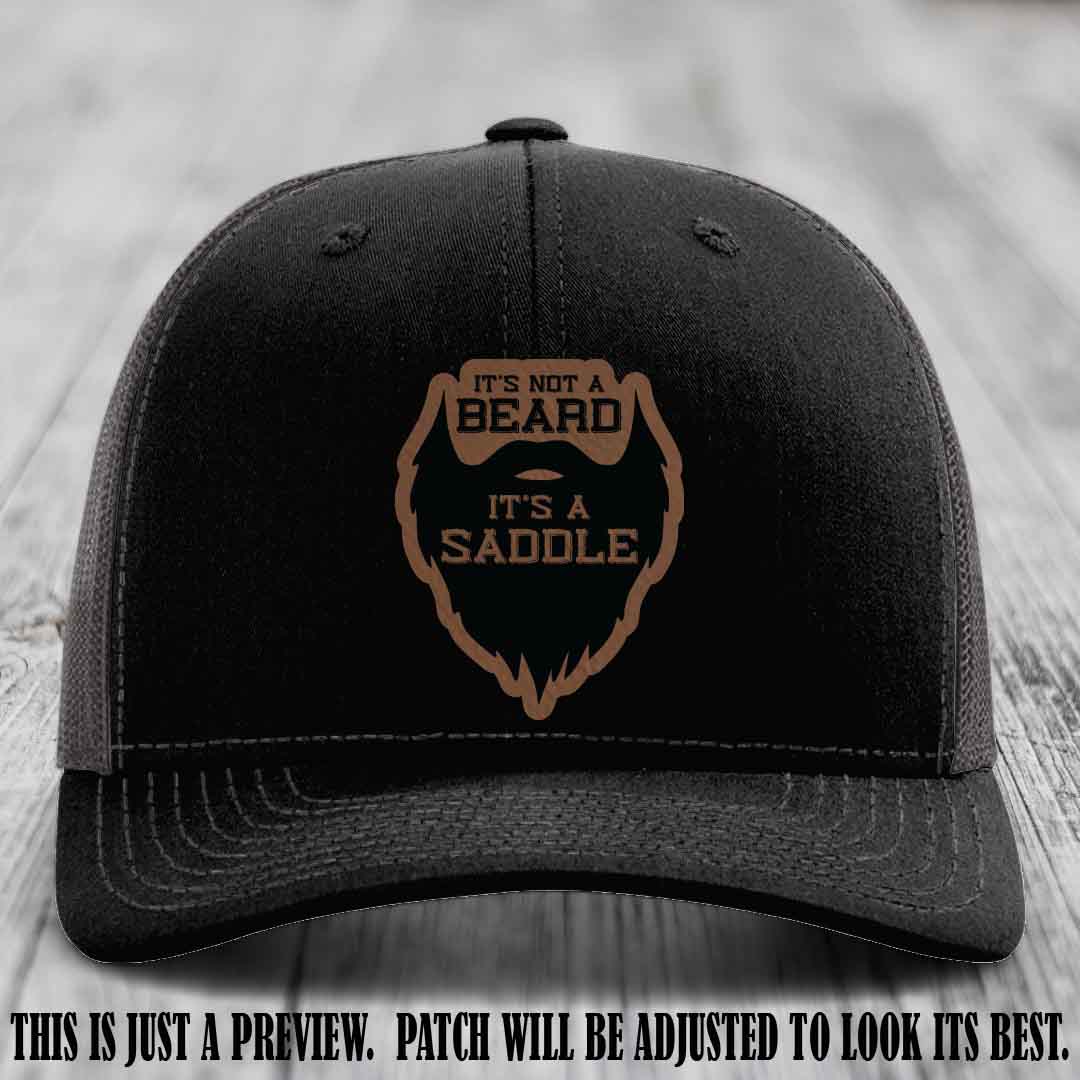 Beard Saddle design on a Dark Brown to Black Patch, Richardson 112 leather patch hat on a Black to Charcoal Hat
