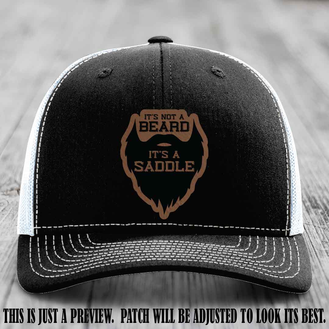 Beard Saddle design on a Dark Brown to Black Patch, Richardson 112 leather patch hat on a Black to White Hat