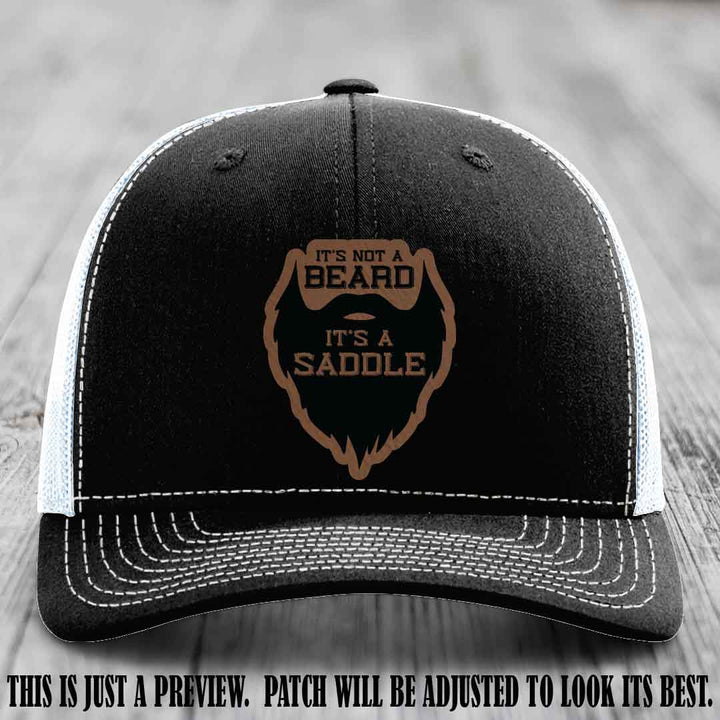 Beard Saddle design on a Dark Brown to Black Patch, Richardson 112 leather patch hat on a Black to White Hat