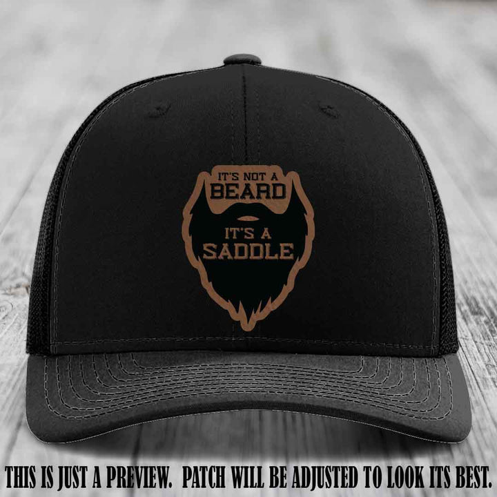 Beard Saddle design on a Dark Brown to Black Patch, Richardson 112 leather patch hat on a Black Hat