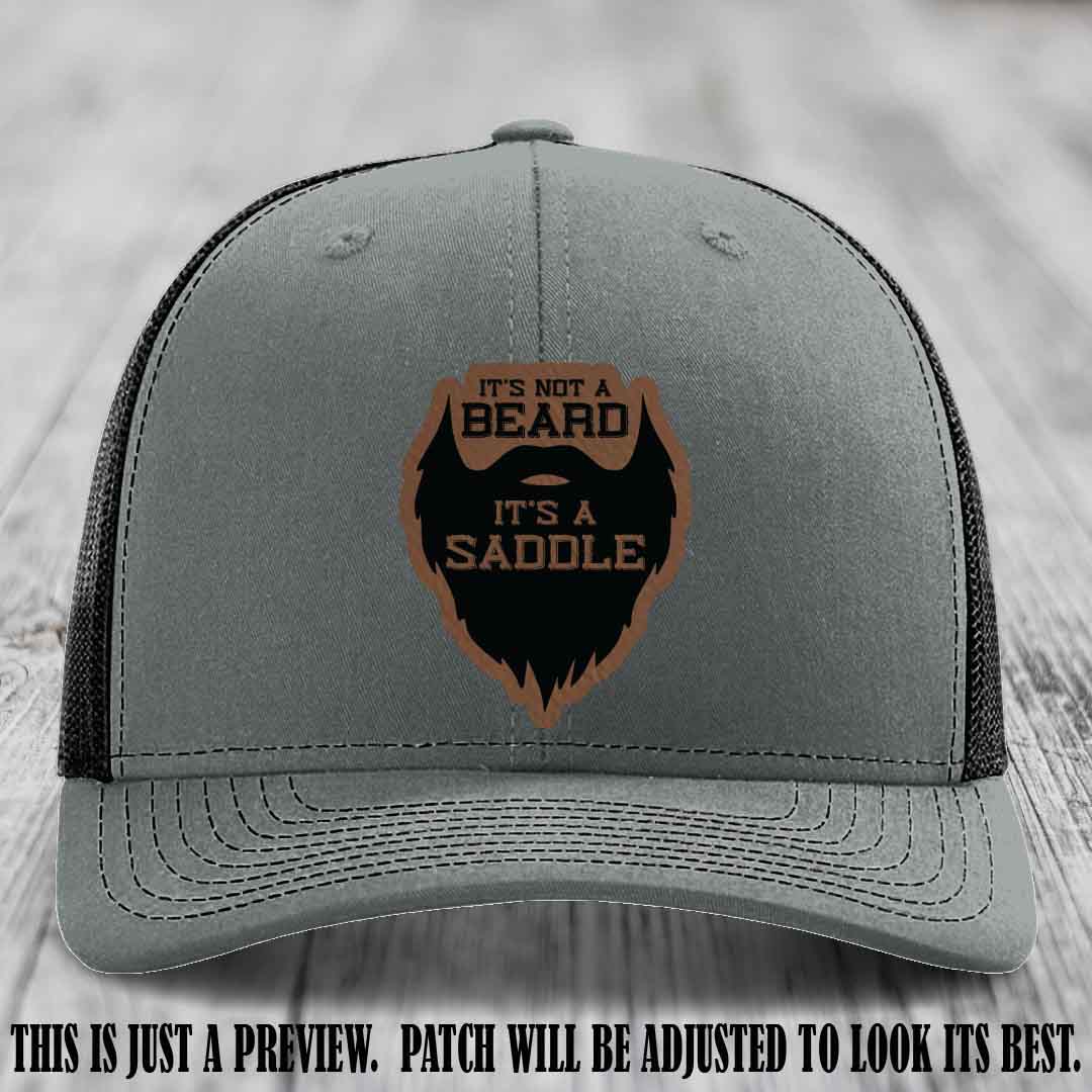 Beard Saddle design on a Dark Brown to Black Patch, Richardson 112 leather patch hat on a Heather Grey to Black Hat
