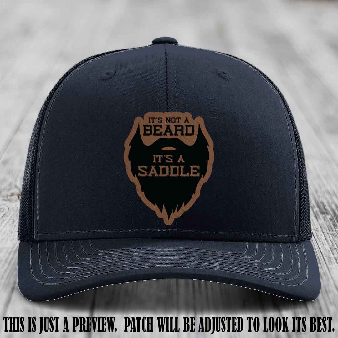 Beard Saddle design on a Dark Brown to Black Patch, Richardson 112 leather patch hat on a Navy Hat
