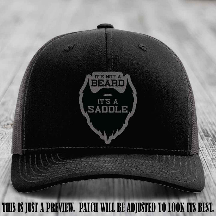 Beard Saddle design on a Grey to Black Patch, Richardson 112 leather patch hat on a Black to Charcoal Hat