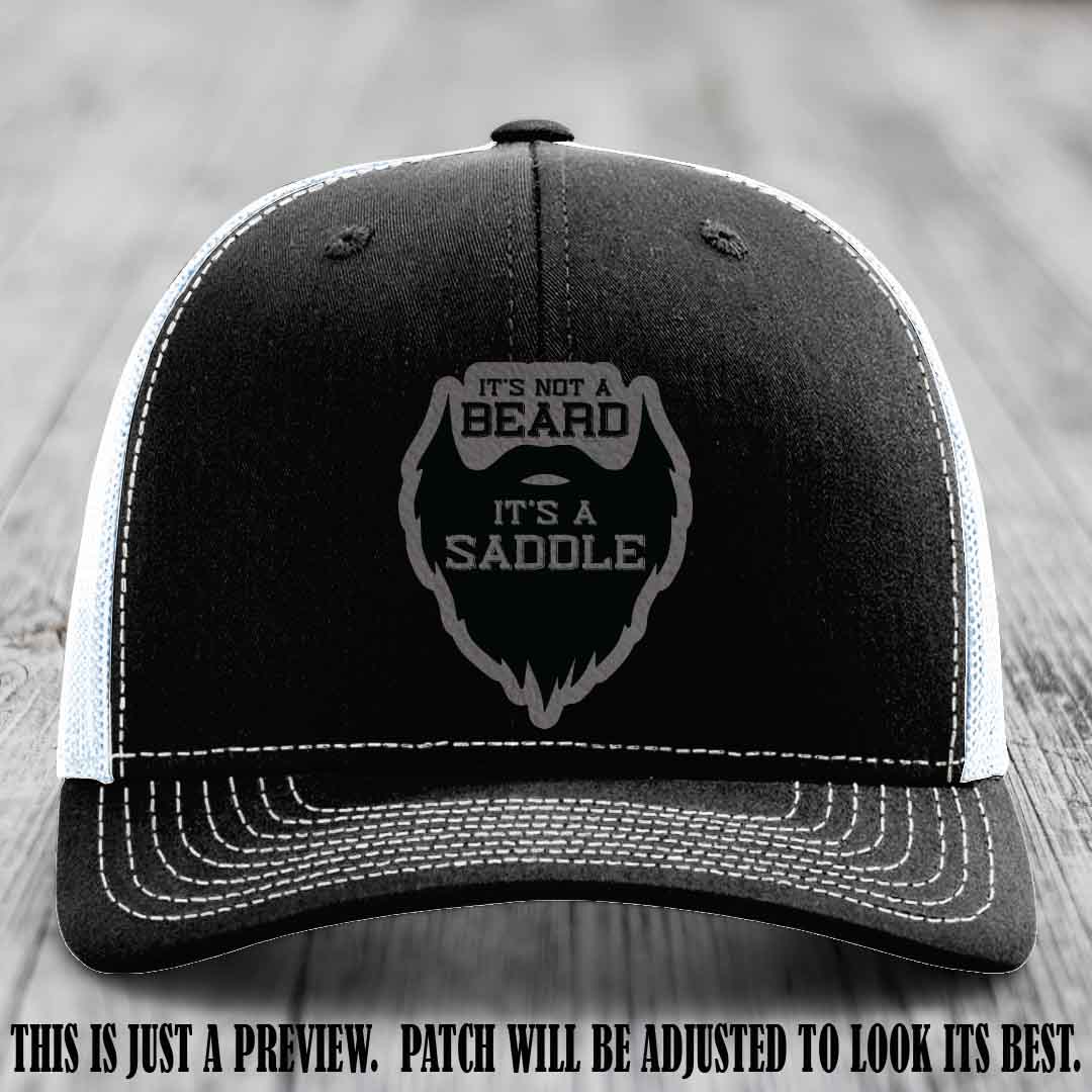 Beard Saddle design on a Grey to Black Patch, Richardson 112 leather patch hat on a Black to White Hat